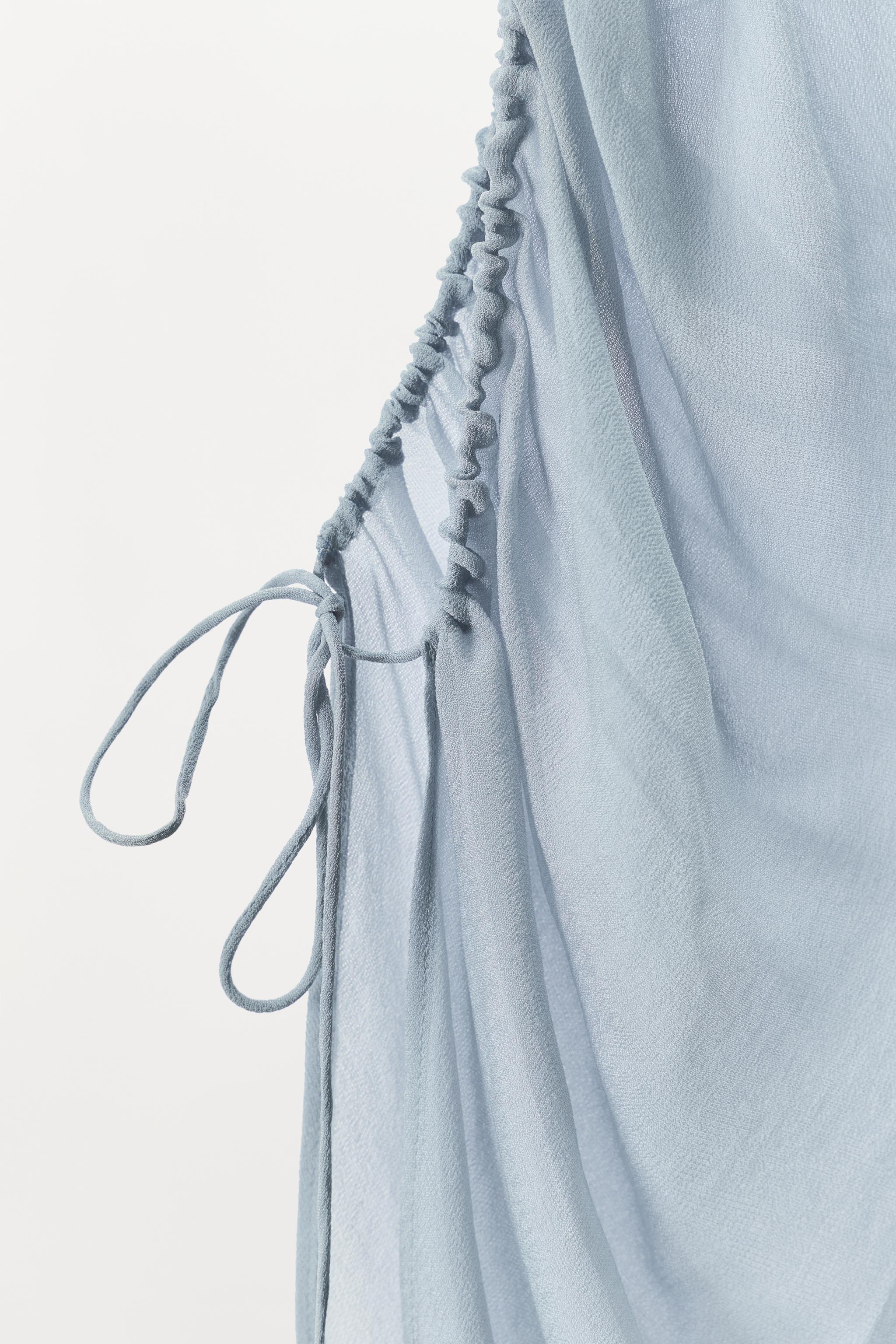 SEMI-SHEER DRAPED TOP